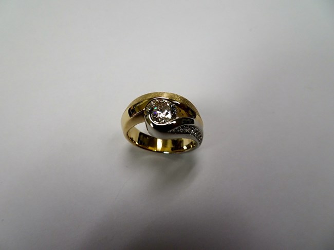 Channel Set Diamond in Yellow and White Gold Image